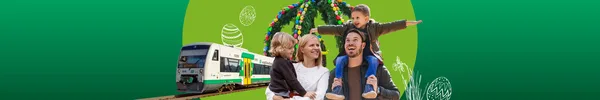 Eine Familie steht im Vordergrund. Im Hintergrund sind die vogtlandbahn und ein traditioneller Osterkranz zu sehen.